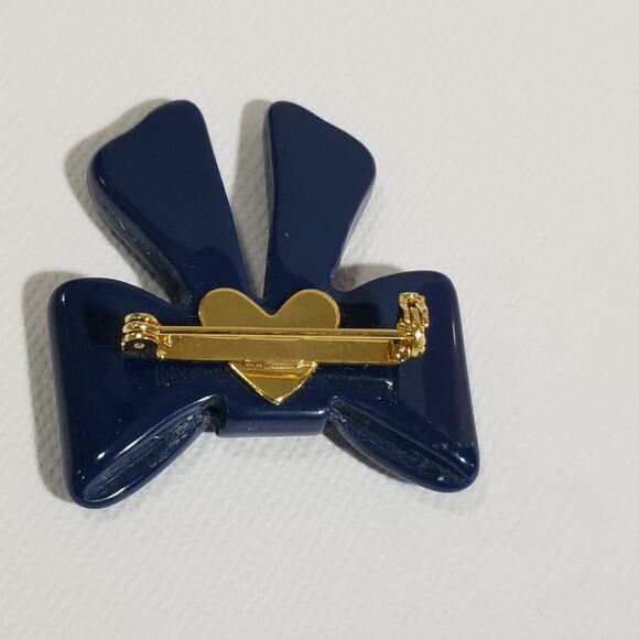 Vintage blue bow brooch (looks green under black light) - Picture 5 of 11